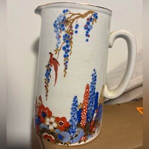 Floral Ceramic Pitcher with Red and Blue Accents